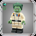 Custom LEGO mini figure with green skin and a beige outfit on a gray background