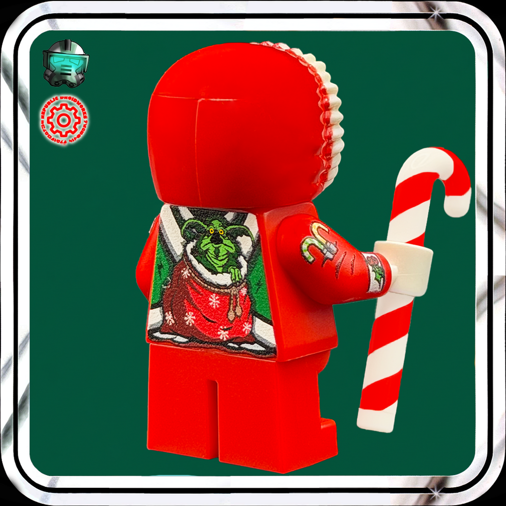 Red Lego figure with a candy cane on a green background