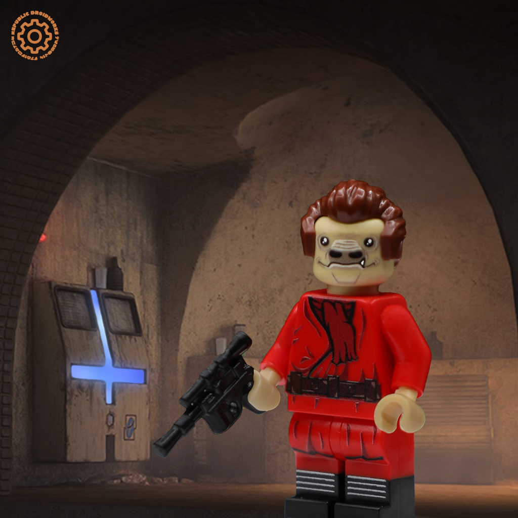 LEGO figure in a red outfit holding a DL-44 blaster in Chalmun’s spaceport casino.