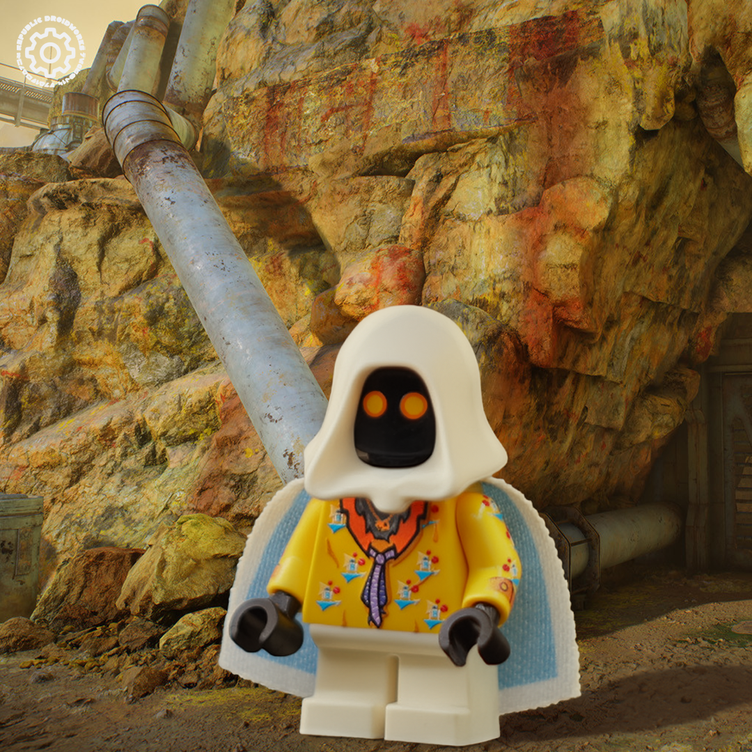 Toy figure in a yellow outfit with a white hood against a rocky background on the planet Kessel.