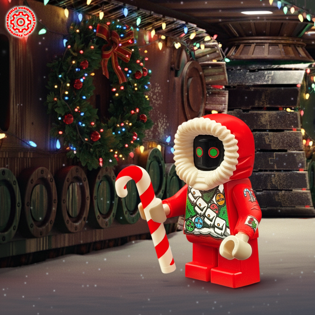 Toy figure in a festive outfit with candy cane, Christmas wreath, and Sandcrawler in background